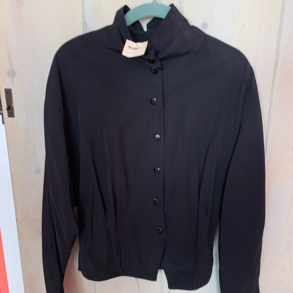 Beautiful expensive blouse. Never worn.